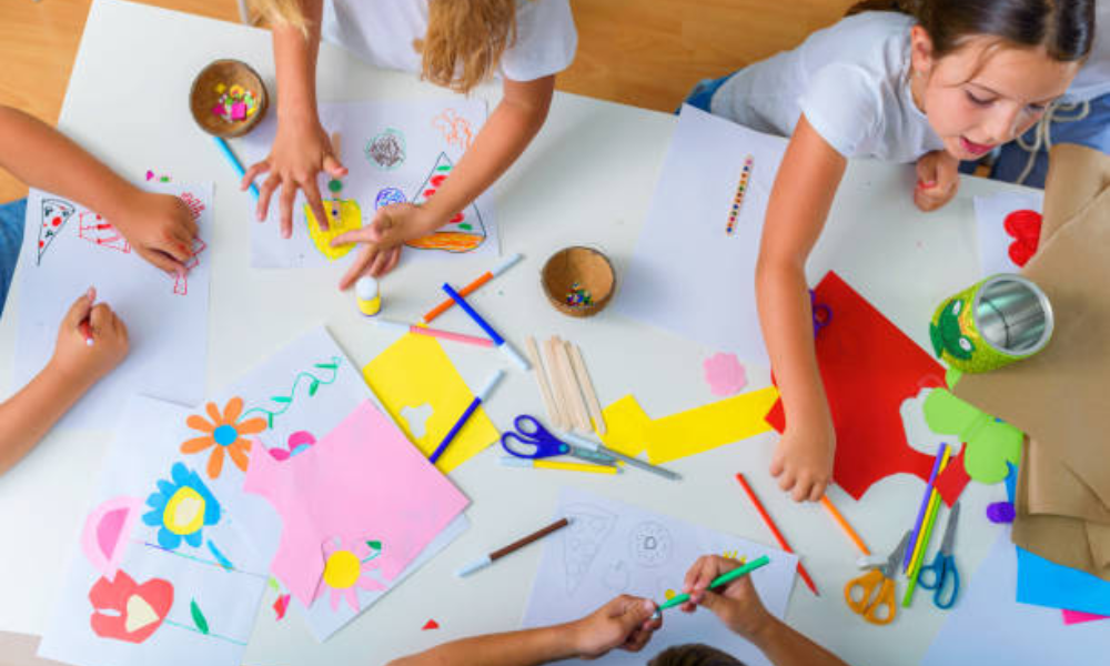 How kids creatively use glue to enhance their art projects?